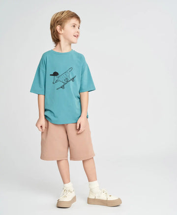 Детски трикотажни шорти в пясъчен нюанс Button Blue