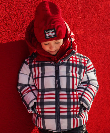 Полусезонно яке с капитонирана подплата и подвижна яка с качулка на каре за момиче Gulliver