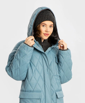 Палто междинен сезон капитонирано с качулка и големи джобове синьо за момиче Button Blue