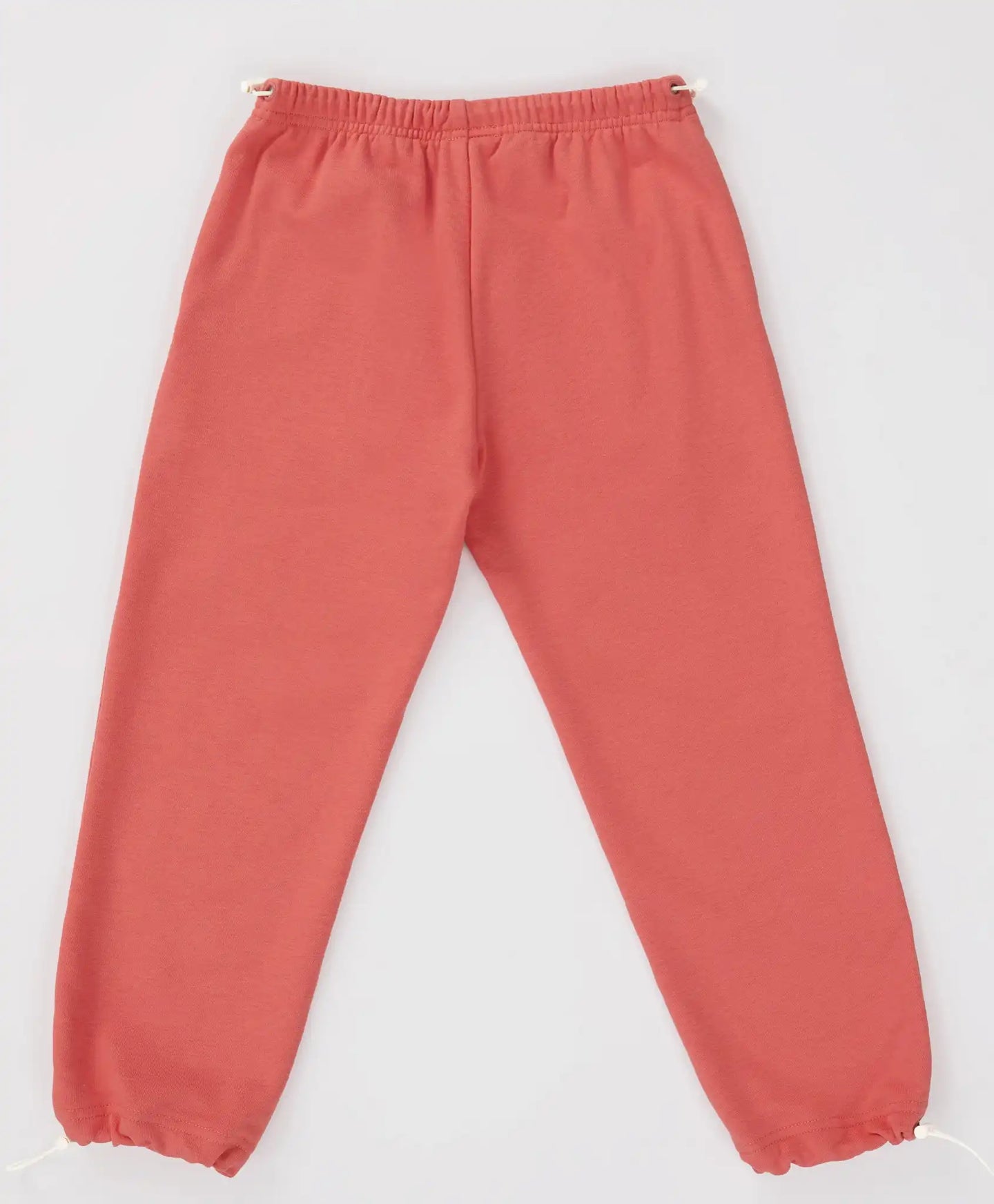 Джогъри с утяжка на колана и крачолите коралови за момиче Button Blue