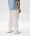 Текстилни панталони за момиче с колан, стеснени, бели Gulliver