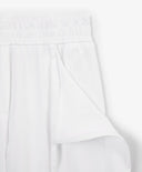 Панталони тип „труби“ за момиче от трико с подвижни детайли бели Gulliver