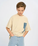 Тениска с къс ръкав за момче млечнобяла оверсайз с принт Button Blue