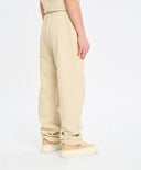 Детски спортни панталони бели с ластичен колан и принт Button Blue