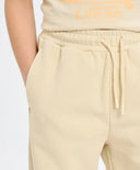 Детски спортни панталони бели с ластичен колан и принт Button Blue