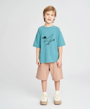 Детски трикотажни шорти в пясъчен нюанс Button Blue