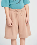 Детски трикотажни шорти в пясъчен нюанс Button Blue