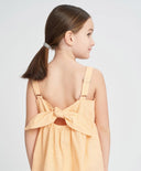 Ленен сарафан с тънки презрамки за момиче оранжев с панделка Button Blue