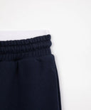 Разкроени панталони с карго джобове и ципове на крачолите тъмносини за момиче Gulliver