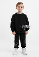 Черни панталони тип джогър от меко и стабилно памучно трико от Gulliver