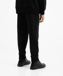 Трикотажни джогъри с принт черни за момче Gulliver