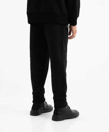 Трикотажни джогъри с принт черни за момче Gulliver