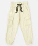 Джогъри с четири джоба и външни шевове кремави за момиче Button Blue