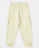 Джогъри с четири джоба и външни шевове кремави за момиче Button Blue